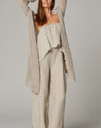 Woman Wearing Estillo Emporio Papillion Jumpsuit - Panna White - Jumpsuits LUXAMORE