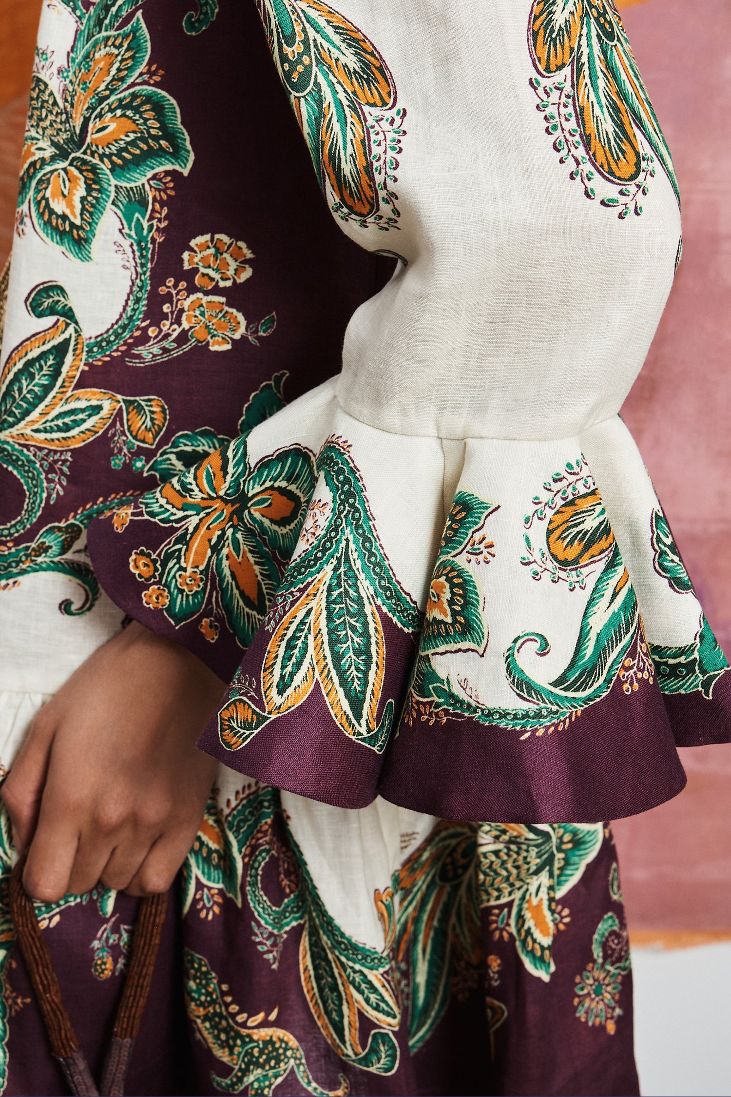 Designer linen day dress: Close-up of the pointed collar, self-covered buttons, and cropped frill sleeves on the Ruthie.. LUXAMORE