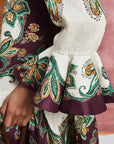 Designer linen day dress: Close-up of the pointed collar, self-covered buttons, and cropped frill sleeves on the Ruthie.. LUXAMORE