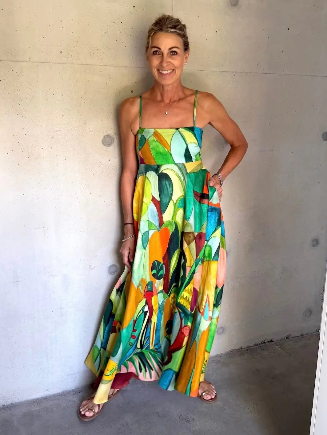 Linen printed maxi dress: ALÉMAIS Mokshini Sundress in a vibrant tropical print featuring a classic square neckline.. LUXAMORE