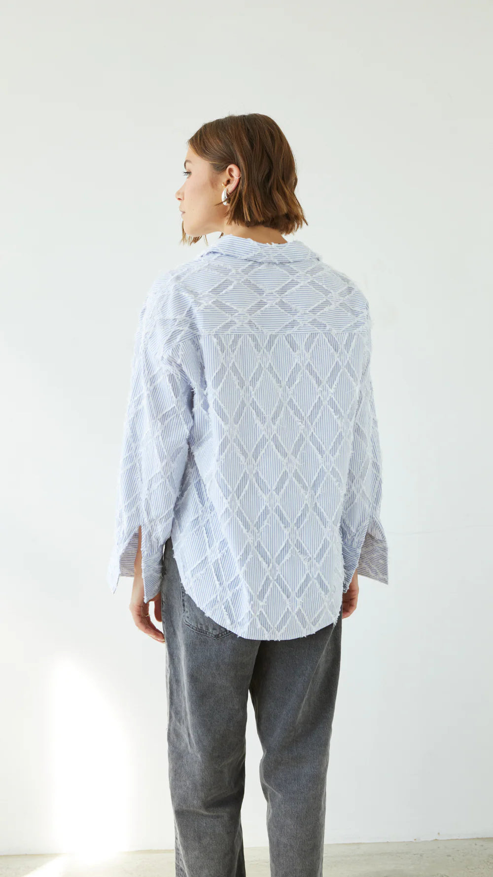 Alemais Sustainable Florence-Shirt close up worn by model LUXAMORE