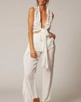 Estilo Emporio Linen Pant Coco worn by model in natural setting LUXAMORE 