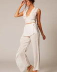 Estilo Emporio Linen Pant Coco worn by model in natural setting LUXAMORE 