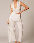 Estilo Emporio Linen Pant Coco worn by model in natural setting LUXAMORE 