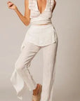 Estilo Emporio Linen Pant Coco worn by model in natural setting LUXAMORE 