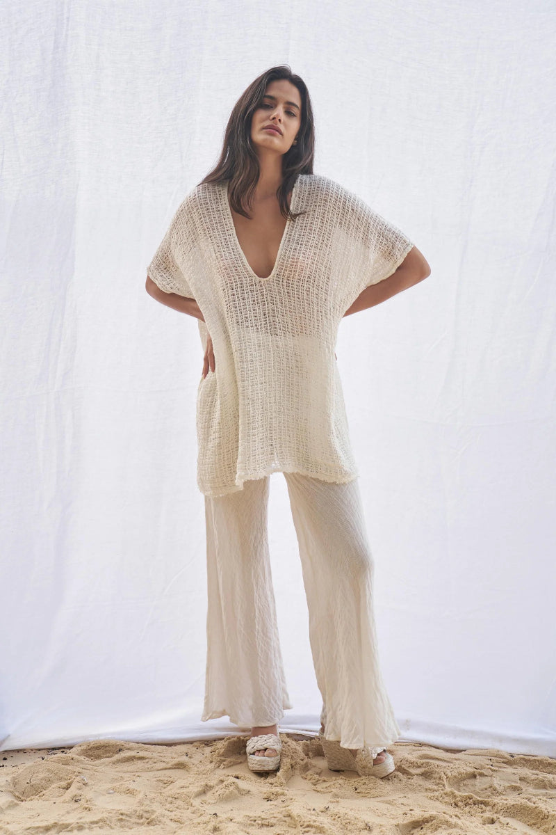 Woman Wearing Estilo Emporio Cuadra Top + Dress Cestino Panna - Dress LUXAMORE