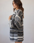 Estilo Emporio Luella Cardigan - Black Multi sustainable knit worn by model in studio LUXAMORE  
