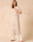 Woman Wearing Estilo Emporio Neve Linen Dress -Tela Atena Panna - Dress LUXAMORE