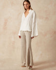 Woman Wearing Estilo Emporio Novo Flare Pant - Brasile Natural - Pants LUXAMORE