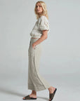 Estilo Emporio Linen Pant Riviera worn by model in natural setting LUXAMORE 