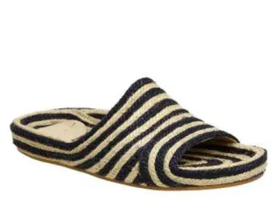 Estilo Emporio Shoes Woven Jute Slide worn by model in natural setting LUXAMORE 