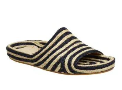 Estilo Emporio Shoes Woven Jute Slide worn by model in natural setting LUXAMORE 