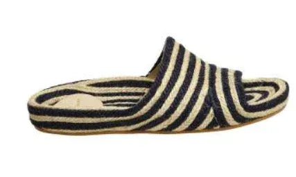 Estilo Emporio Shoes Woven Jute Slide worn by model in natural setting LUXAMORE 