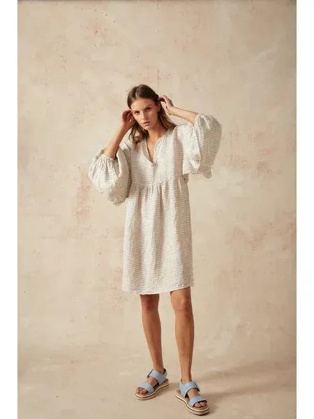 Estilo Emporio Stella Linen Dress - Lyla worn by model in natural setting LUXAMORE 