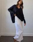 Estilo Emporio Zoe Cashmere - Navy sustainable knit worn by model in studio LUXAMORE  