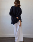 Estilo Emporio Zoe Cashmere - Navy sustainable knit worn by model in studio LUXAMORE  