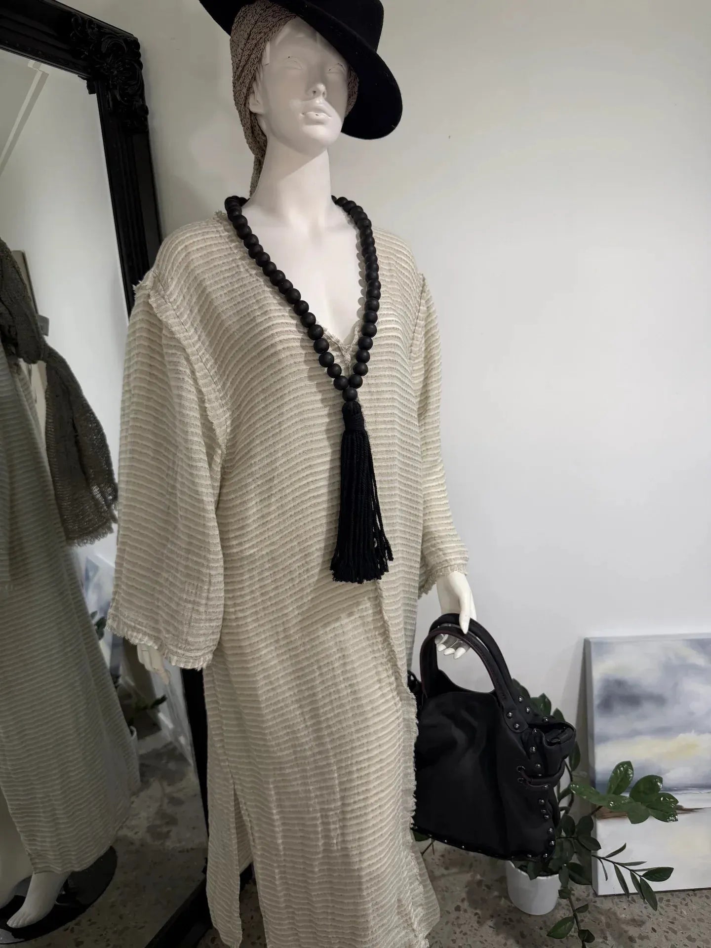 Estilo Emporio Zorba Maxi Linen Dress worn by model in natural setting LUXAMORE 