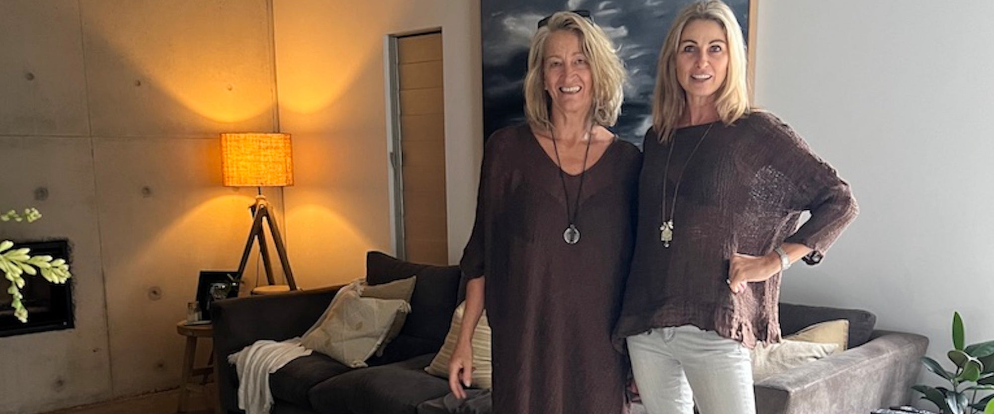 LUXAMORE models in La Bottega di Brunella Top and Dress, Estilo Emporio Pants lifestyle at home. 