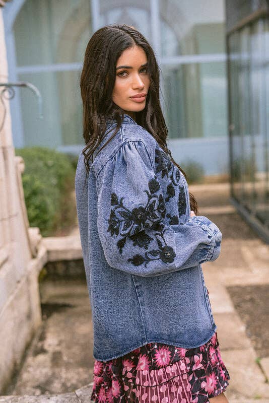 Floral Cosmos Denim Boho Embroidered Overshirt worn by model in natural setting LUXAMORE 