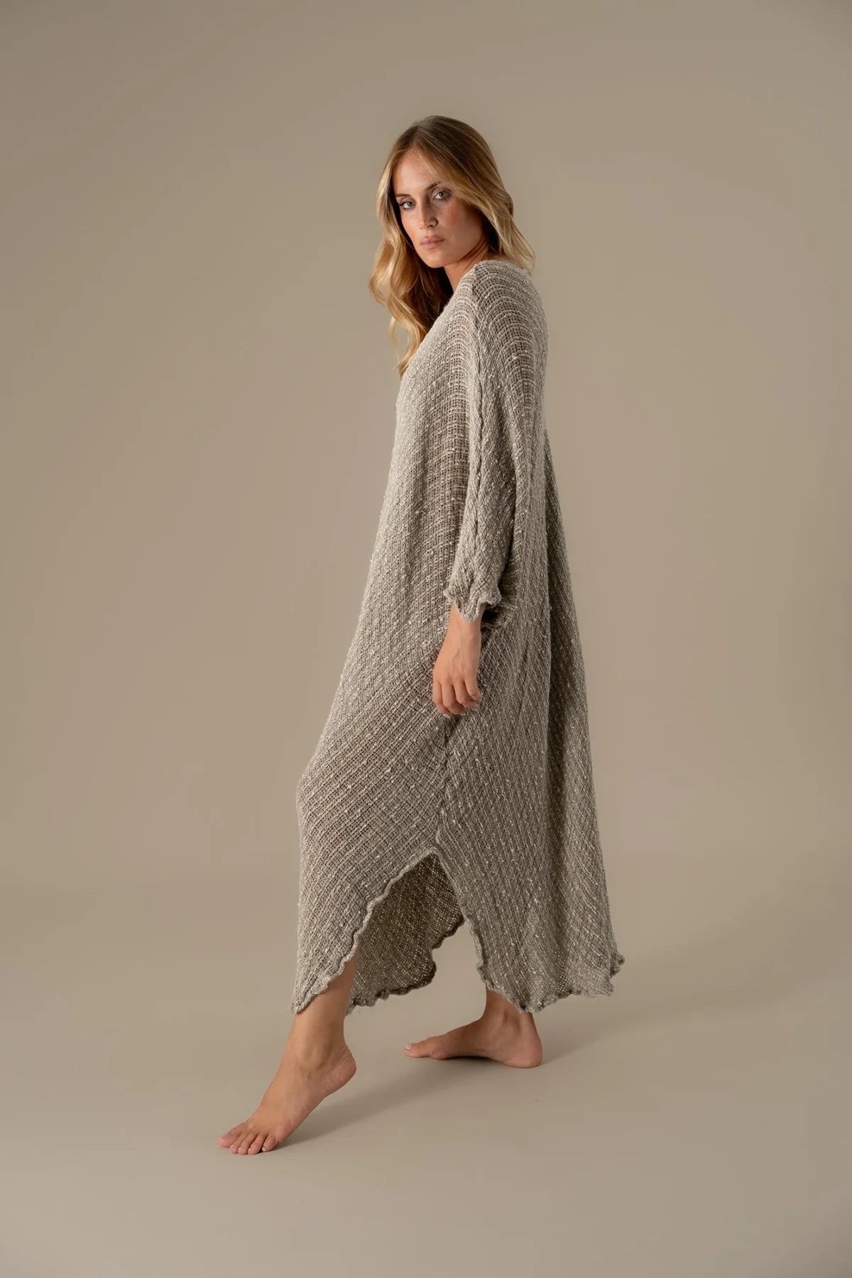 Person wearing La Bottega di Brunella Linen Dress VESTITO FAUSTA - Campagna Luxor linen dress LUXAMORE 