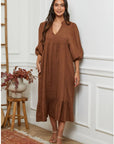 Linen Dress Balloon Sleeve - Made in Italy - Tobacco worn by model in natural setting LUXAMORE 