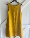 Woman Wearing Linen Dress Midi A Line Pockets Made in Italy Yellow - Dress LUXAMORE