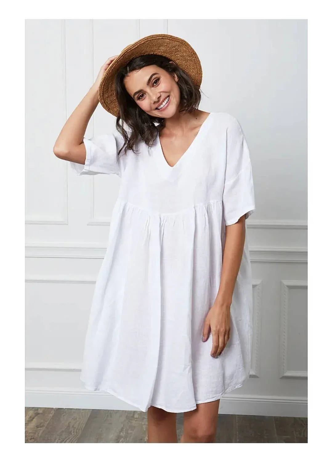 woman wearing Linen Dress Mini Babydoll Made in Italy - Taupe LUXAMORE 