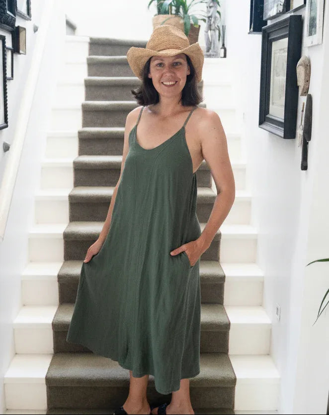 Linen Slip Dress Midi Made in Italy Khaki worn by model in natural setting LUXAMORE 