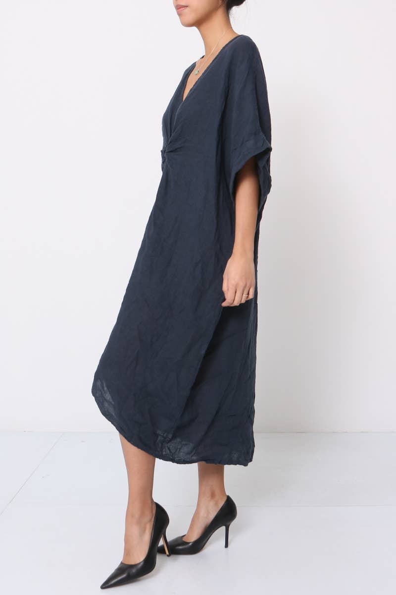Woman Wearing Linen Dress V-neck Knot Front Midi Made in Italy Navy - Dress LUXAMORE