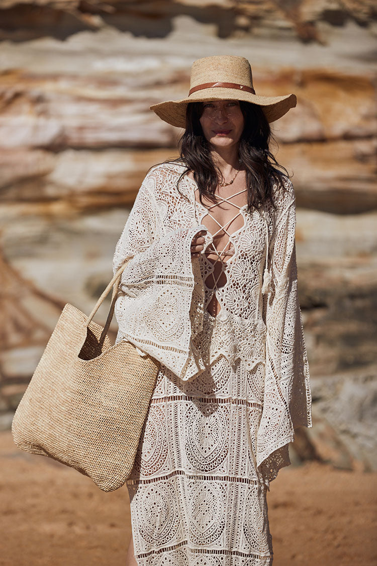 woman holding Made in Mada Dina M Bag  LUXAMORE