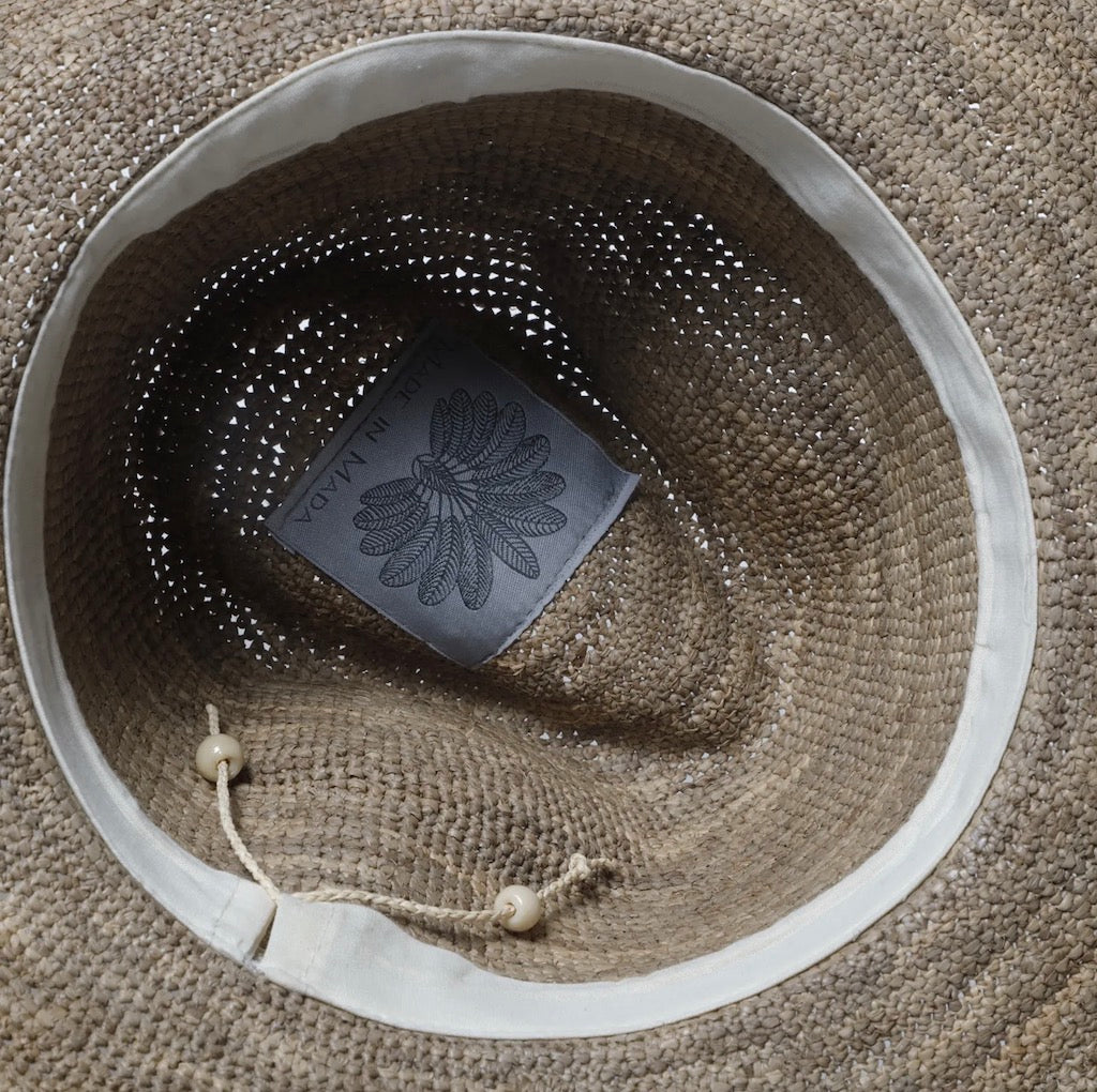 Woman Wearing Made in Mada Hat AZIZ - hat LUXAMORE
