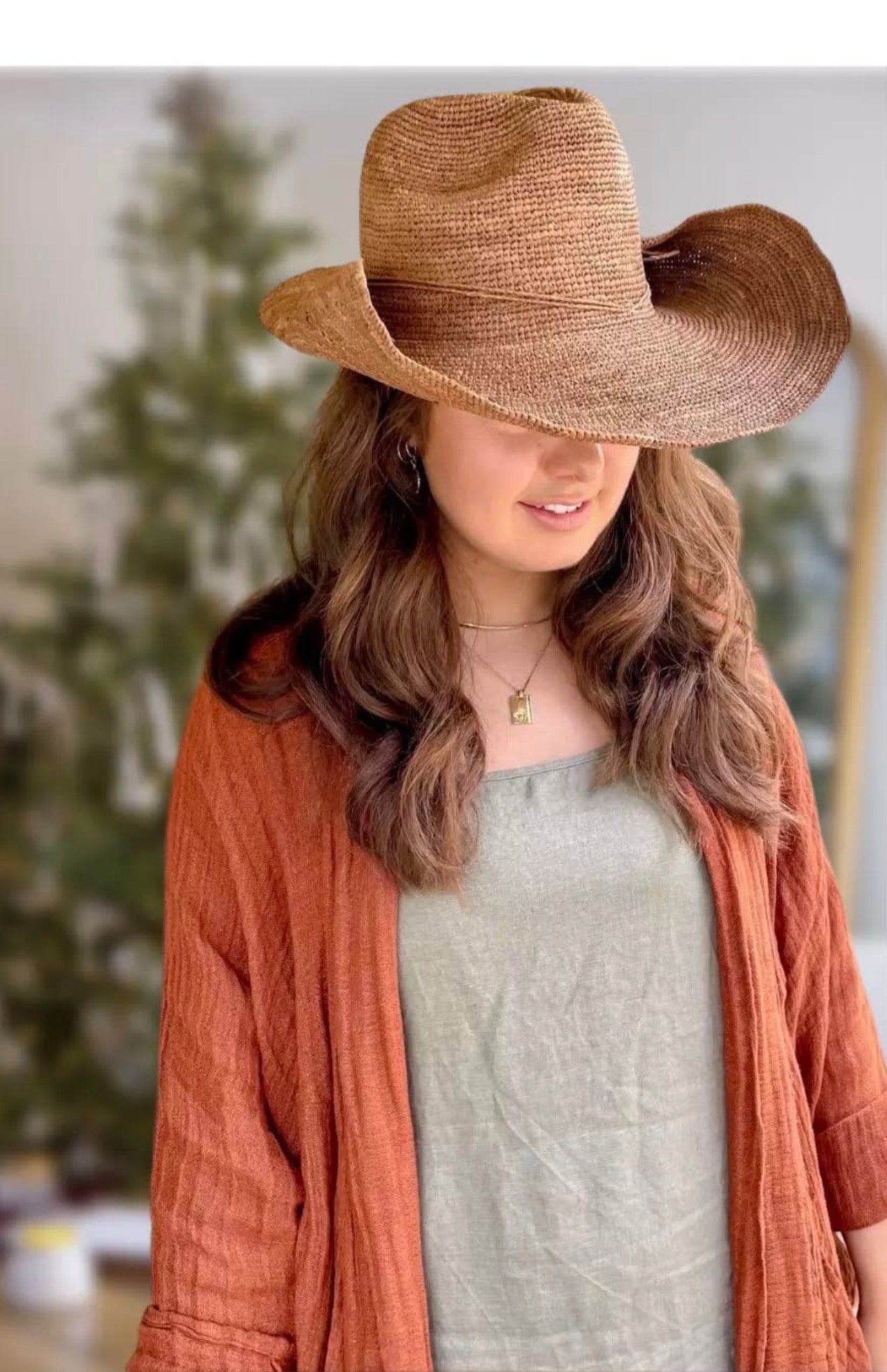 Woman Wearing Made in Mada Hat AZIZ - hat LUXAMORE