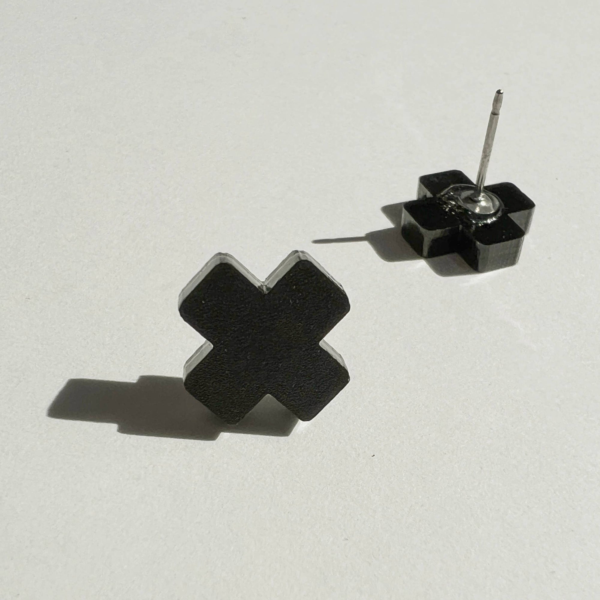 Woman Wearing Mingled Black Cross Stud Earrings - Small Cross Earrings, Minimalist - Earings LUXAMORE