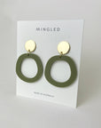 Woman Wearing Mingled Charlie Olive Green and Gold Dangle Earrings - Earings LUXAMORE