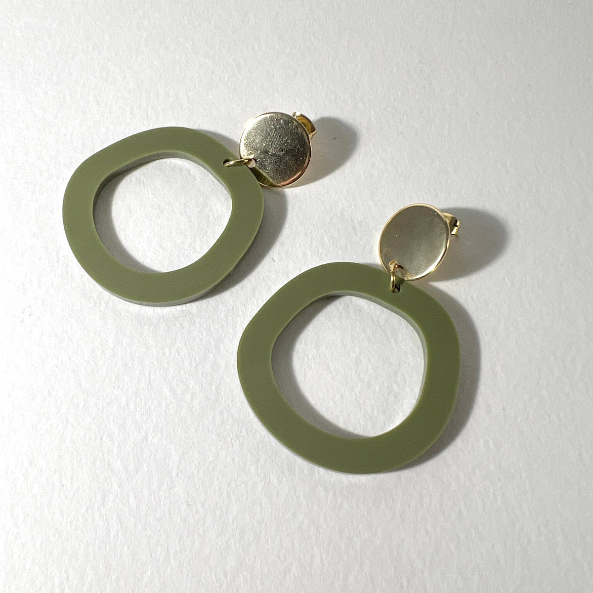 Woman Wearing Mingled Charlie Olive Green and Gold Dangle Earrings - Earings LUXAMORE