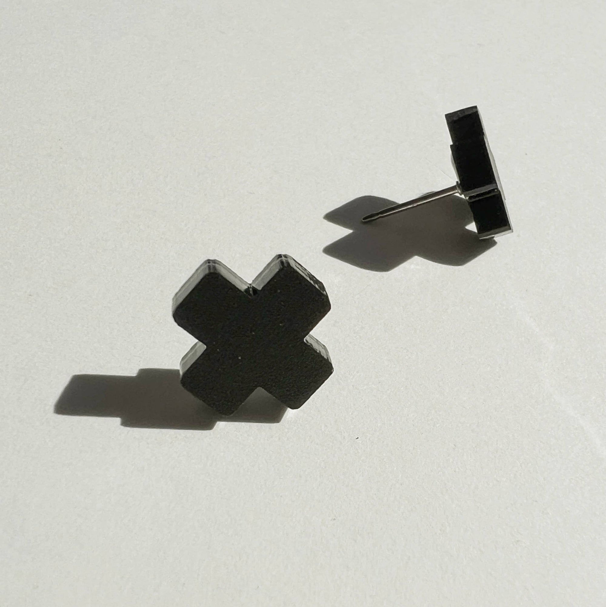 Woman Wearing Mingled Black Cross Stud Earrings - Small Cross Earrings, Minimalist - Earings LUXAMORE