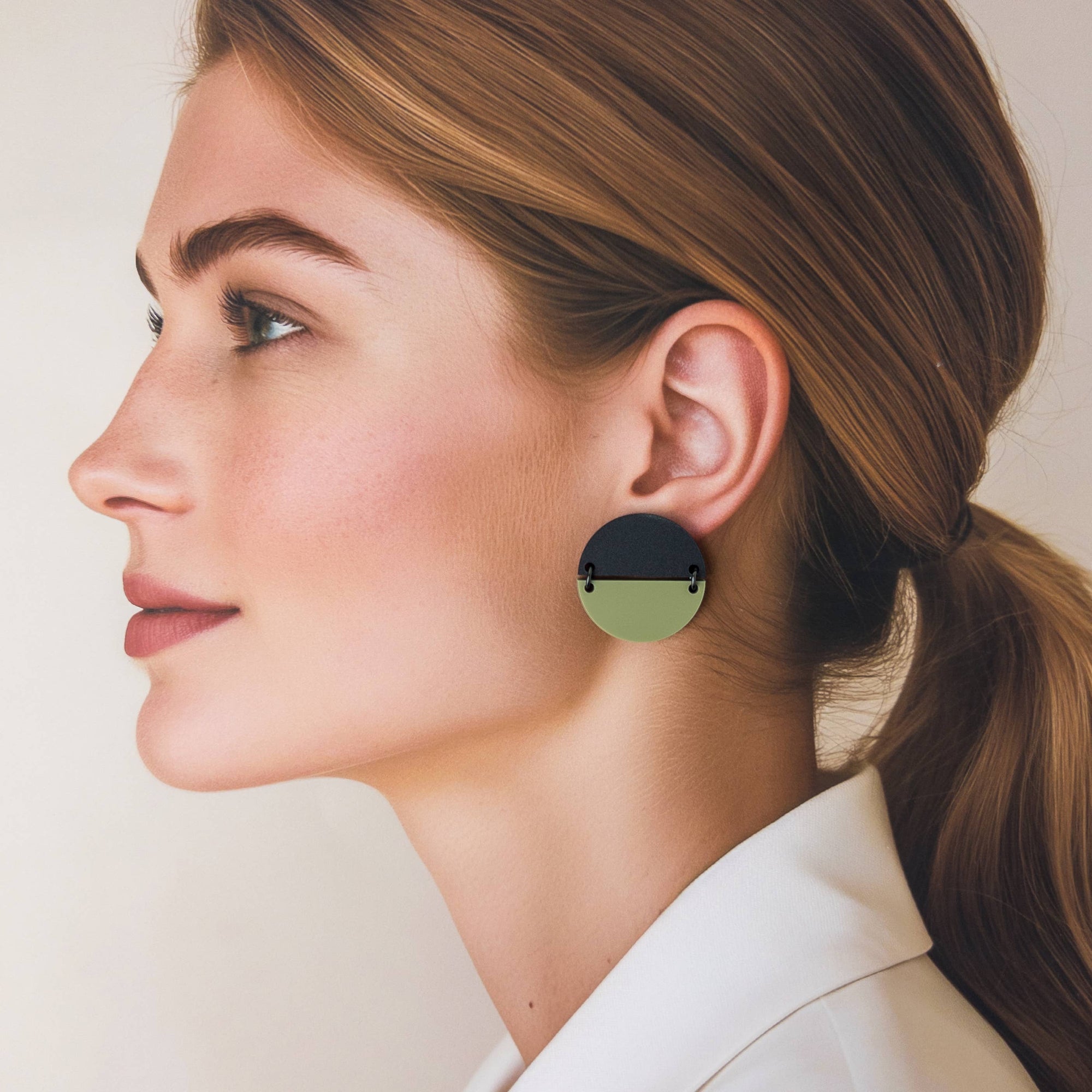 Woman Wearing Mingled Statement Studs in Olive Green and Black -  LUXAMORE