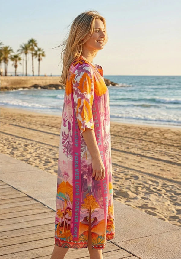 Maxi shirt dress: Miss Goodlife Dress Trumpet Arms Violet Sea featuring a multicolor print and short trumpet sleeves.