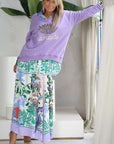 Miss Goodlife Green Garden Skirt worn by model in natural setting LUXAMORE 