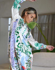 Miss Goodlife Midi Dress Green Garden Made in Italy worn by model in natural setting LUXAMORE 