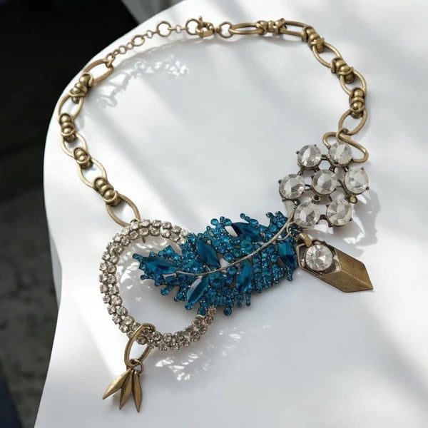 Woman Wearing Orna Curio Vintage Bespoke Lagoon Leaf Statement Necklace - necklace LUXAMORE