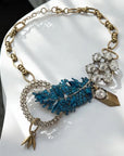 Orna Curio Vintage Bespoke Lagoon Leaf Statement Necklace - LUXAMORE -necklace-One of a Kind – Hand-crafted Necklace This exquisite necklace is a unique blend of vintage and modern elements, hand-crafted in Perth, WA. A symbol of the impeccable beauty and craftsmanship of Orna Curio Jewellery. Measurements: 60cm Adjustable Materials: Vintage Elements with Vintage Gold Plated Alloy