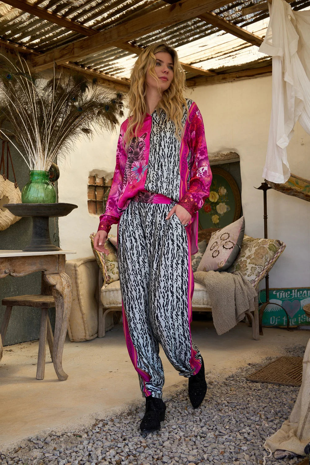 Pre Order Miss Goodlife Pink Animal Love Pants worn by model in natural setting LUXAMORE 