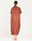Sanctamuerte Dress worn by model in natural setting LUXAMORE 