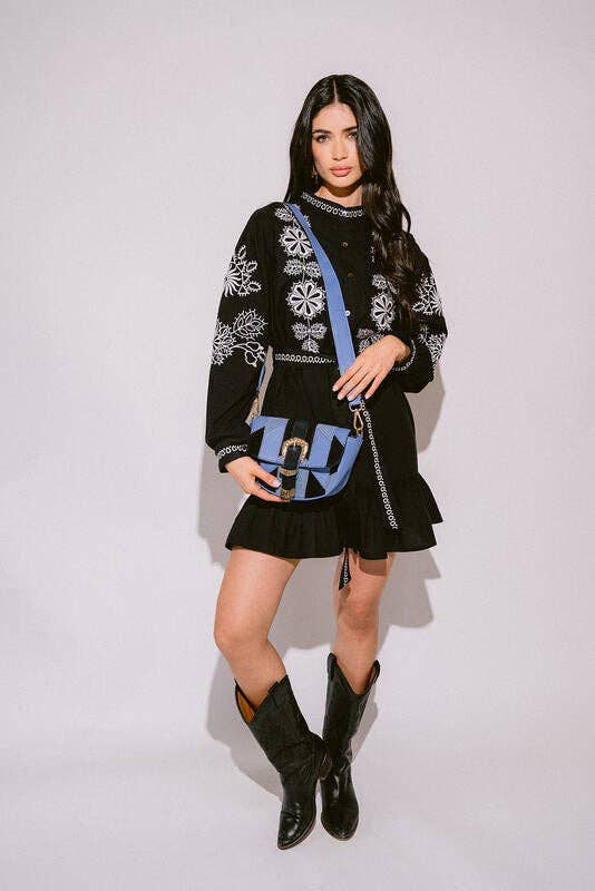 Verona Black & White Short Boho Embroidered Dress worn by model in natural setting LUXAMORE 