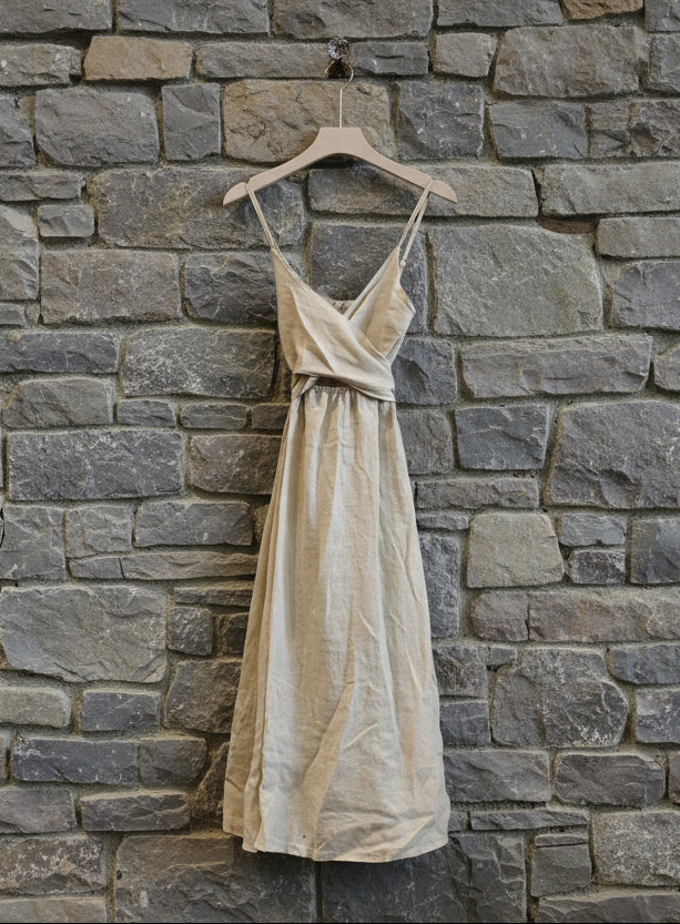 women wearing REF 25811 DRESS WITH CROSSED BOW 100% LINEN: BEIGE  LUXAMORE 
