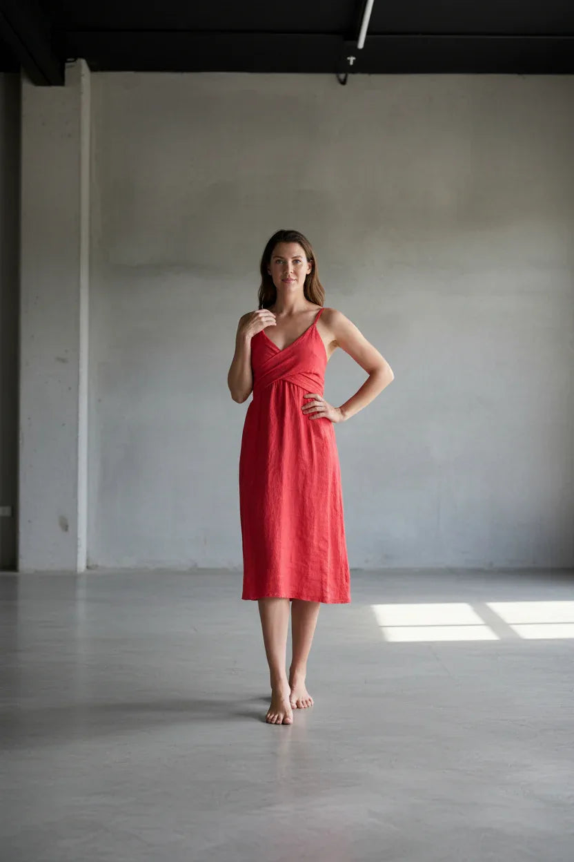 Italian Linen Dress Cross tie Coral Made in Italy worn by model in natural setting LUXAMORE 
