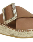 Estilo Emporio Husk Tan Slide - LUXAMORE -Shoes-Estilo Emporio Slide These espadrille slides have been handmade in Spain from vaqueta leather and topped with a tortoiseshell-embellished buckle. They have a platform heel and padded contoured leather footbeds to ensure a comfortable fit. Upper: LeatherInsole: LeatherOutsole: Rubber Height: 3cm Made in Spain