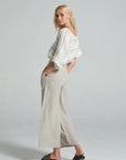 Estilo Emporio Linen Pant Riviera worn by model in natural setting LUXAMORE 